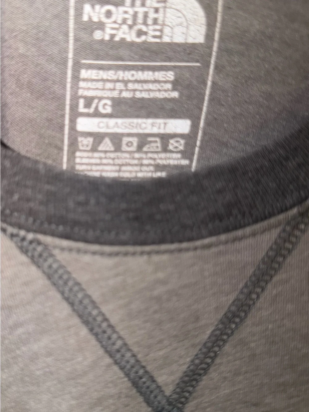 North Face shirt with two toned gray in men’s size Large